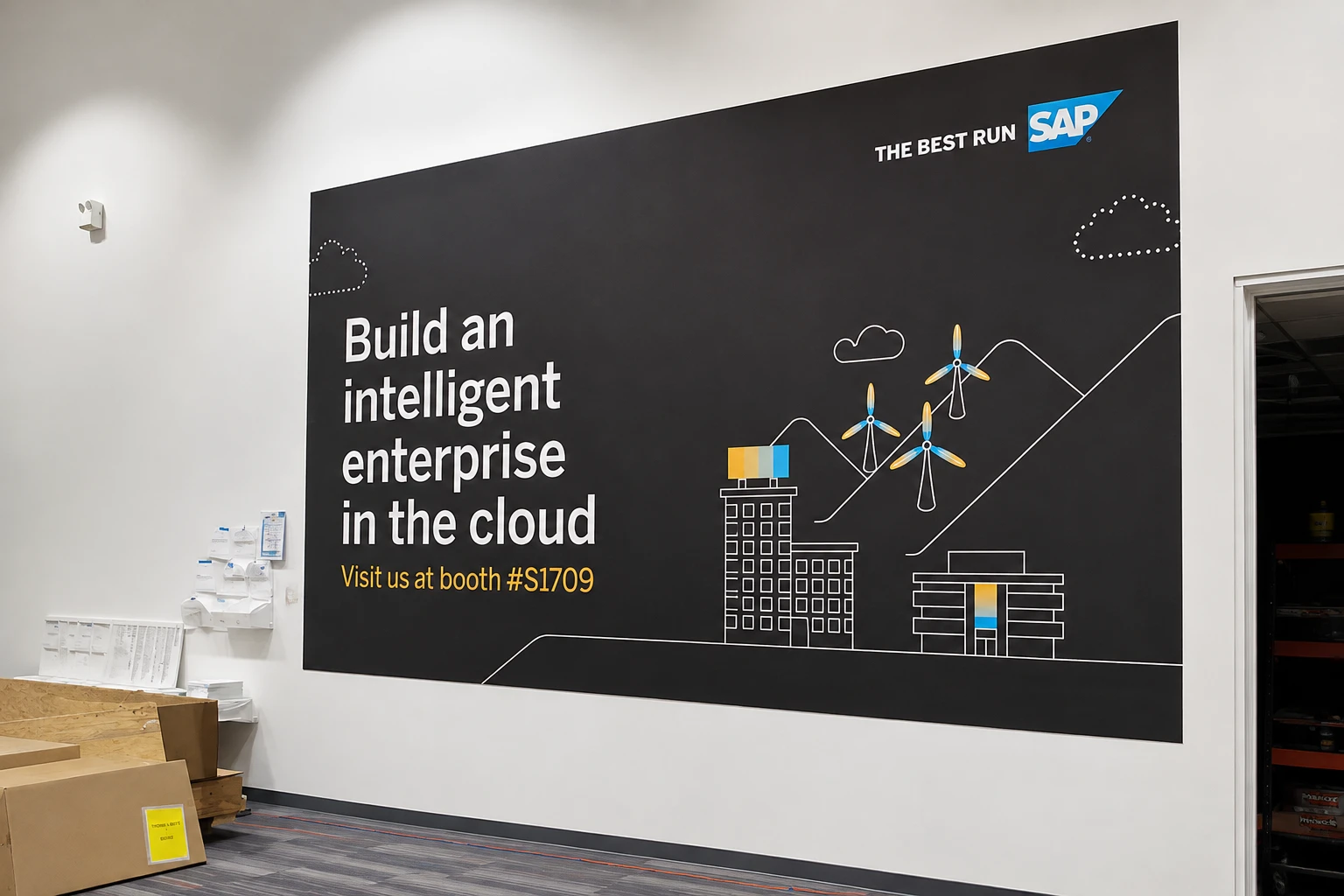 Large-format branded wall graphic installed in a commercial space
