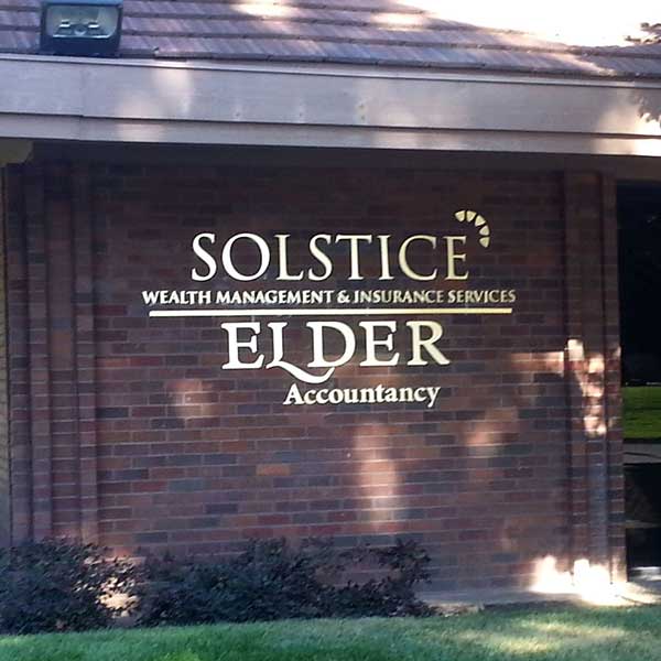 Brushed metal exterior building sign