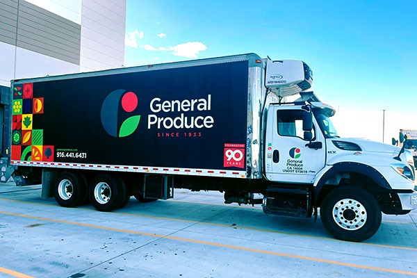 General Produce 26 foot box truck with a full black vinyl fleet wrap and logo graphics