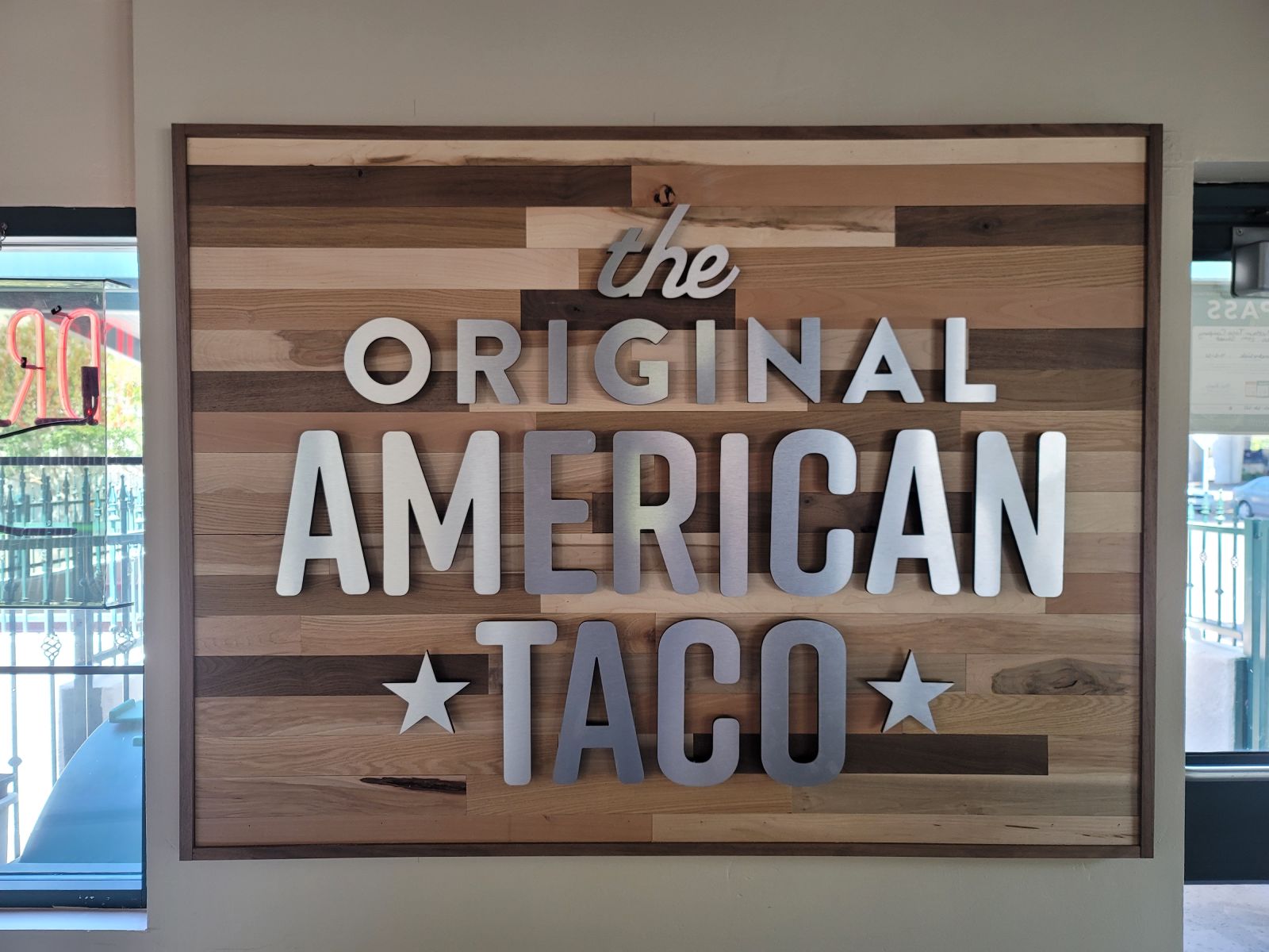 Dimensional wood restaurant sign for The Original American Taco